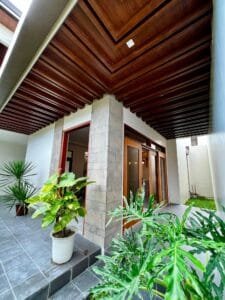 Modern tropical home for sale in Angeles City with semi-furnished interiors